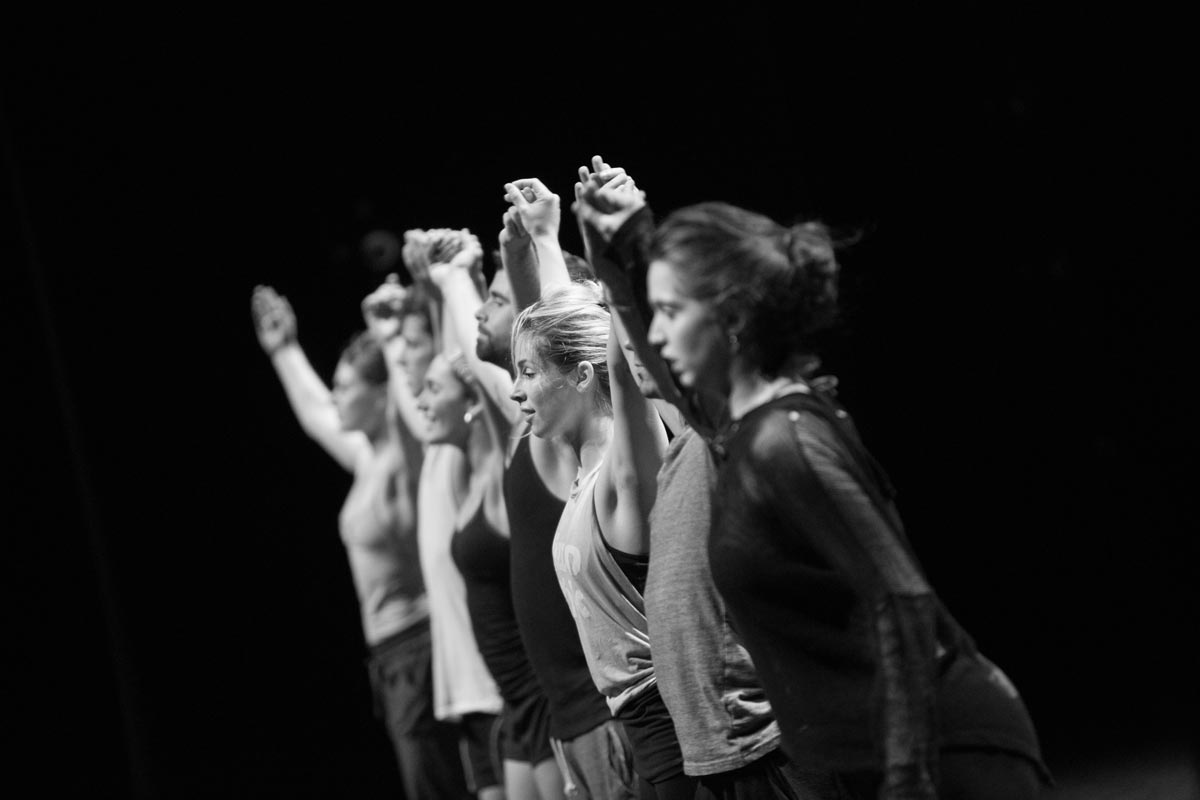 Modern dancers bow at end of performance